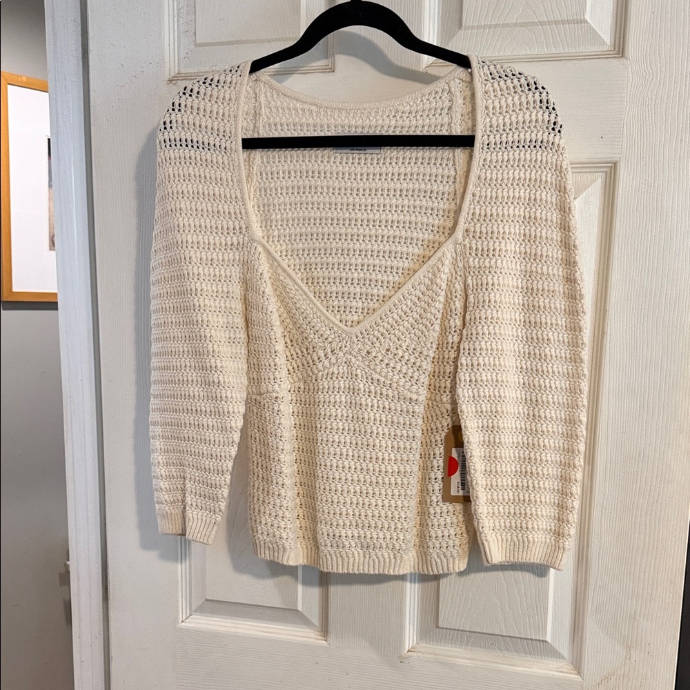 Elegant V-Neck Cream Sweater